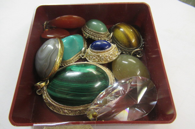 TEN VARIOUS HARDSTONE AND OTHER PENDANTS Image