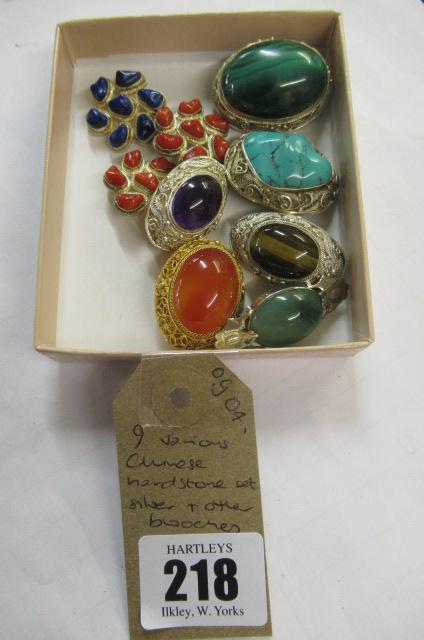 NINE VARIOUS CHINESE HARDSTONE SILVER SET AND OTHER BROOCHES Image