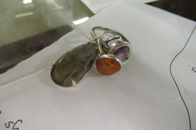 TWO SILVER GEMSTONE RINGS AND SILVER PENDANT Image