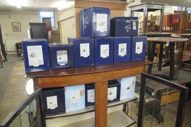 THIRTEEN BOXED FRANZ PORCELAIN FLOWER CUPS AND SAUCERS Image