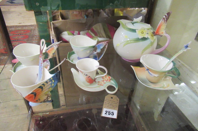 COLLECTION OF FRANZ PORCELAIN BUTTERFLY CUPS  SAUCERS  SPOONS AND TEAPOT Image