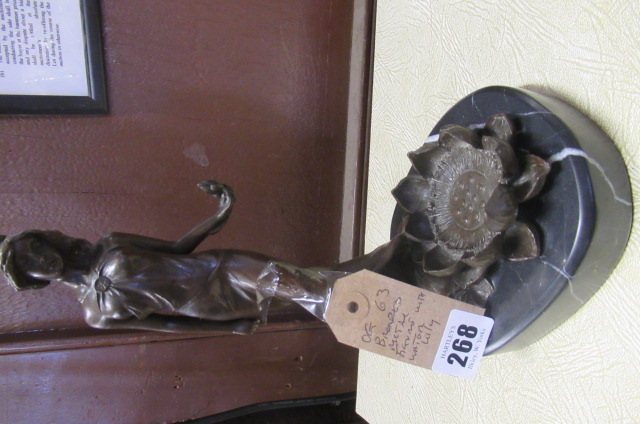 BRONZED METAL FIGURE WITH WATER LILY Image