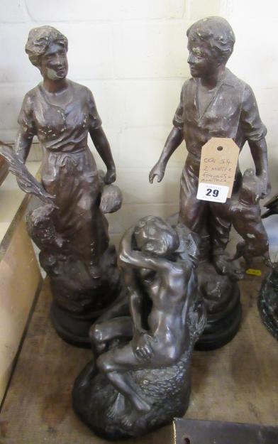 TWO METAL FIGURES AND ANOTHER Image