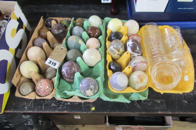 COLLECTION OF MARBLE AND OTHER EGGS AND STANDS Image