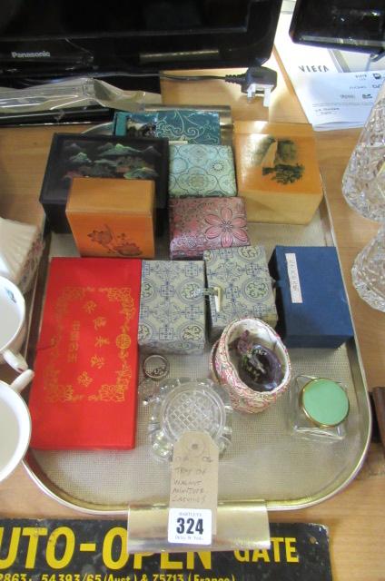 TRAY OF WALNUT SHELL MINIATURE CARVINGS Image