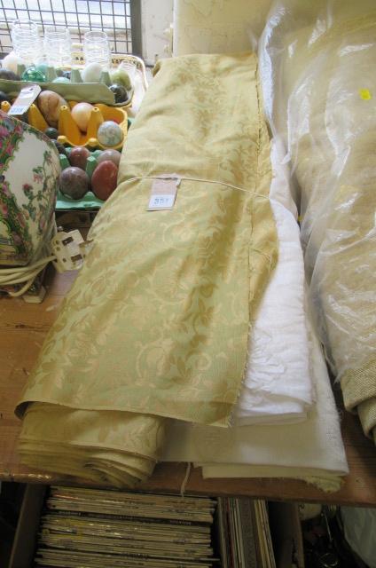 THREE ROLLS OF FABRIC Image