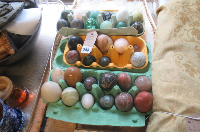 COLLECTION OF MARBLE AND OTHER EGGS WITH STANDS Image