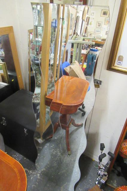 FOUR MATCHING WAVY MIRRORS Image