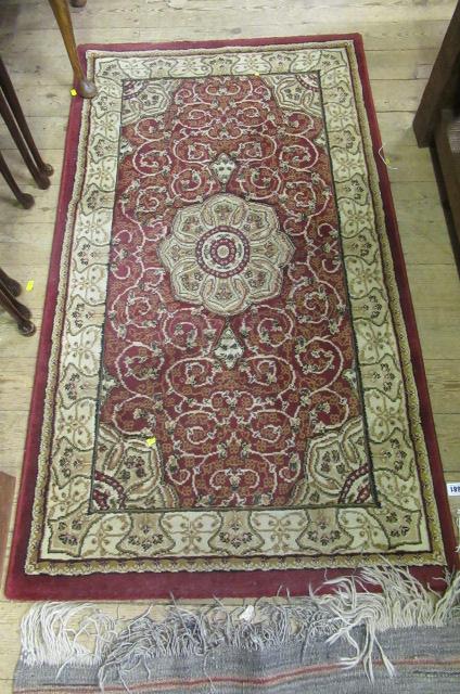 SMALL BURGUNDY AND CREAM RUG Image