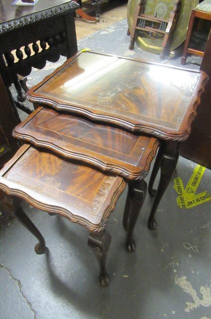 NEST OF THREE GLASS TOPPED TABLES Image