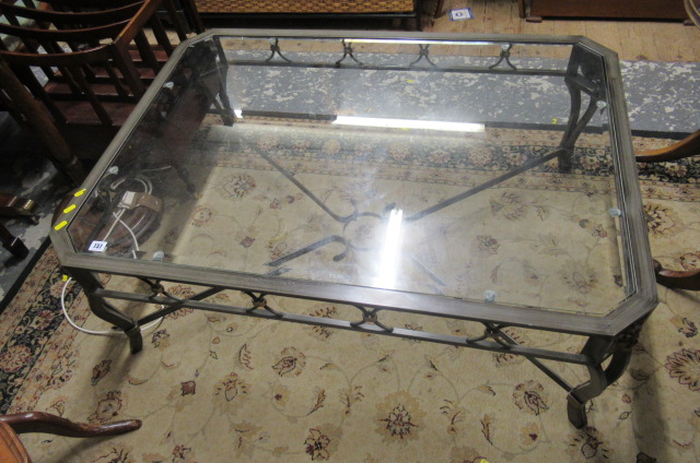 GLASS TOPPED METAL COFFEE TABLE Image