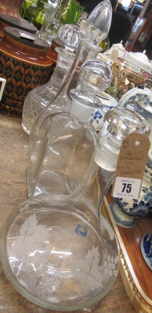 FOUR DECANTERS INCLUDING A SHIPS DECANTER Image