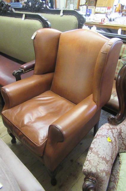 BROWN LEATHER WINGBACK ARMCHAIR Image
