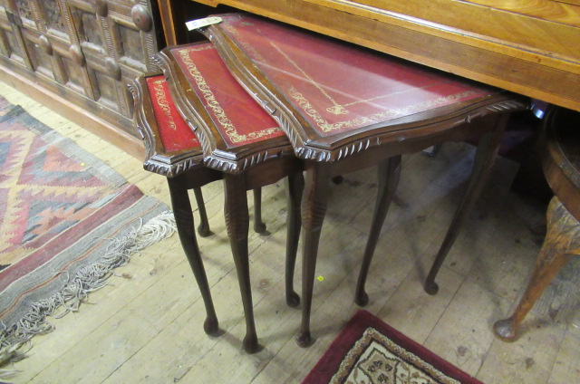NEST OF THREE GLASS TOPPED TABLES Image