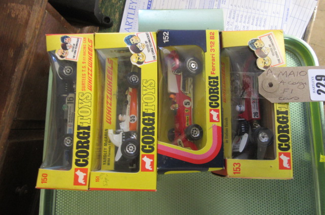 FOUR CORGI F1 CARS Image