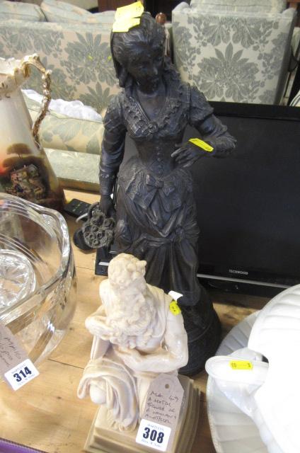 METAL FIGURE OF A WOMAN AND ANOTHER Image