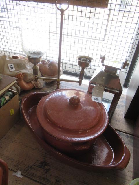 BRASS LAMP CANDLE LAMP AND A COOKING POT Image