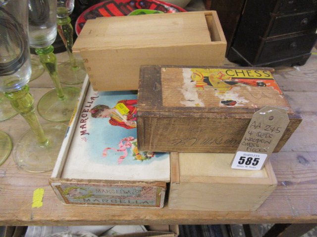 FOUR SETS OF WOODEN CHESS PIECES Image