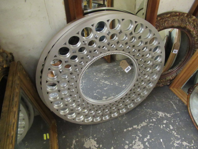 THREE CIRCULAR MIRRORS Image