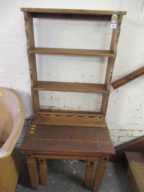 TWO TABLES AND A WOODEN PLATE RACK Image
