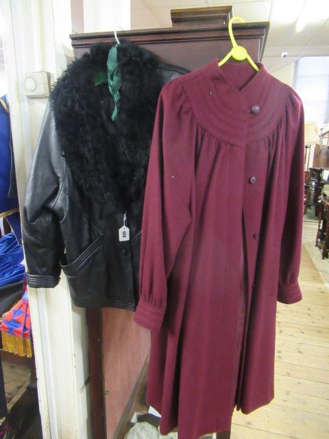 BLACK LEATHER JACKET AND A CRIMSON COAT Image