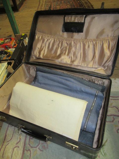 SUITCASE AND CONTENTS Image