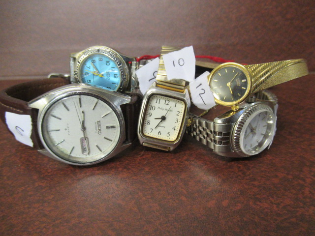 FIVE WRISTWATCHES Image