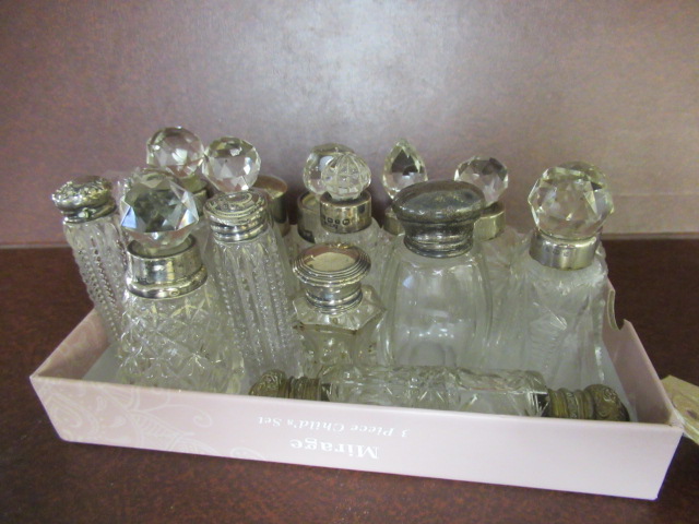 BOX OF SILVER MOUNTED BOTTLES Image