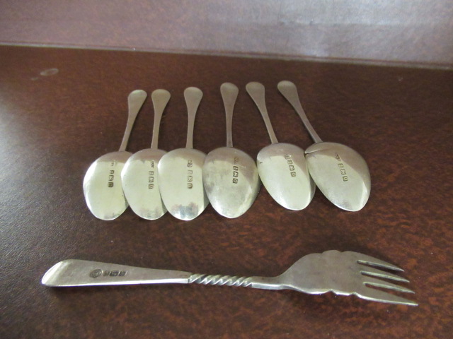 SIX SILVER TEASPOONS AND A SILVER FORK Image