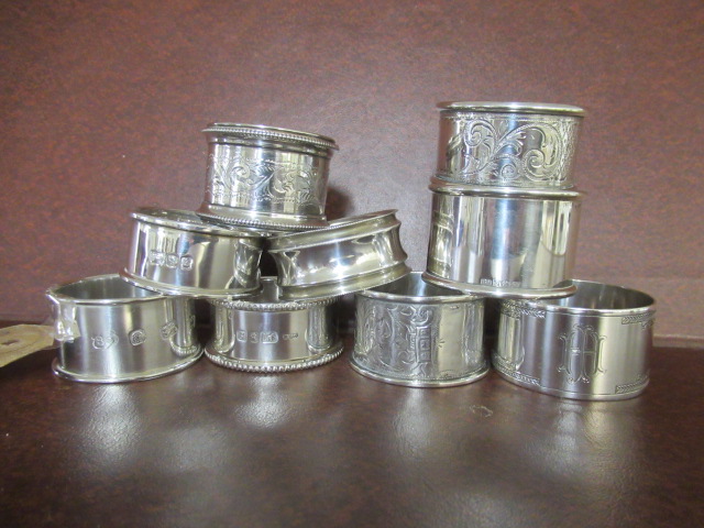 NINE SILVER NAPKIN RINGS Image