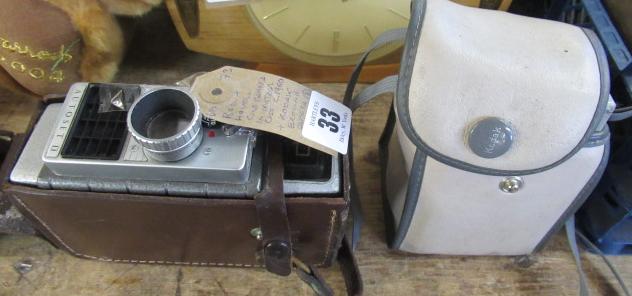 BELL AND HOWELL CINE CAMERA IN LEATHER CASE CIRCA 1960 AND KODAK BROWNIE CAMERA Image