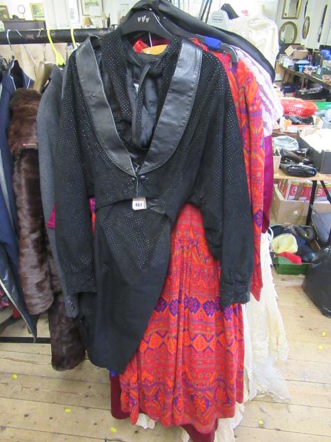 THREE DRESSES AND A SUEDE SUIT Image