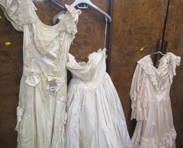 TWO WEDDING DRESSES AND A BRIDESMAID DRESS Image