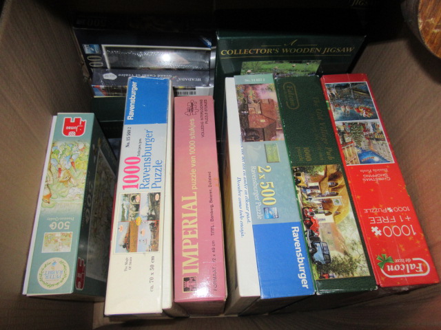 LARGE BOX OF JIGSAW PUZZLES Image