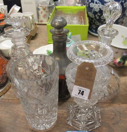 THREE GLASS DECANTERS AND TWO VASES Image