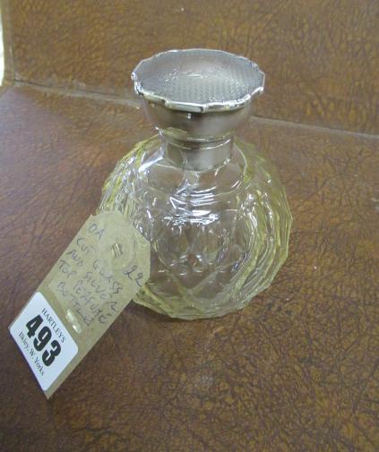 SILVER TOPPED CUT GLASS PERFUME BOTTLE Image