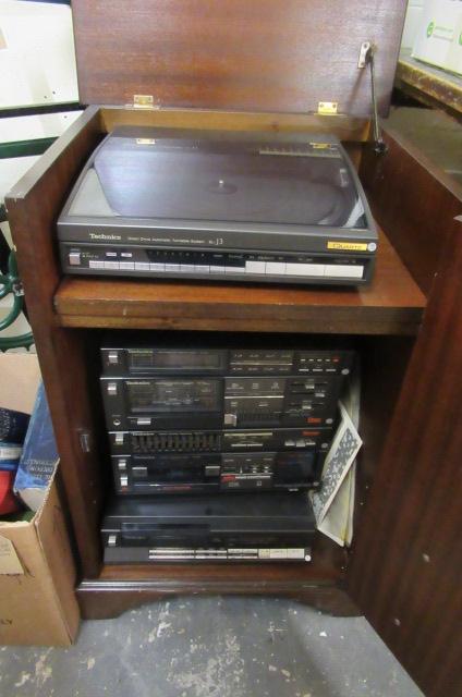 TECHNICS AUDIO SYSTEM IN MAHOGANY CUPBOARD Image