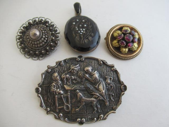 THREE BROOCHES AND A LOCKET Image