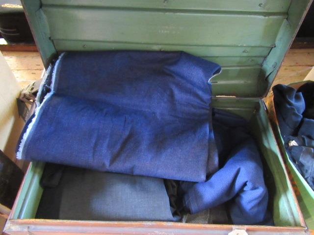 TIN TRUNK WITH A QUANTITY OF FABRIC Image