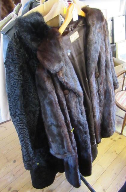 BROWN FUR COAT AND BLACK ASTRAKHAN COAT Image