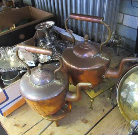 TWO COPPER KETTLES WITH TRIVETS Image