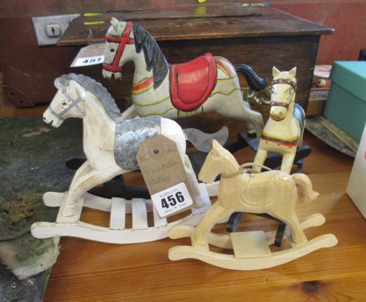 FOUR ROCKING HORSE ORNAMENTS Image