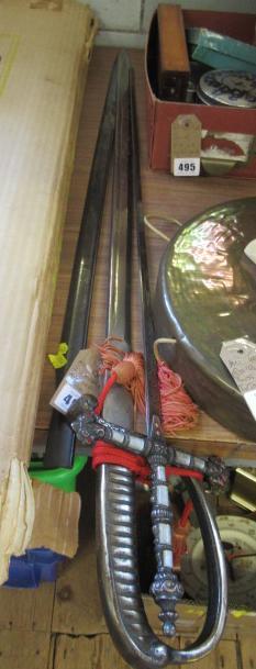 TWO SWORDS AND A SWORD BLADE Image