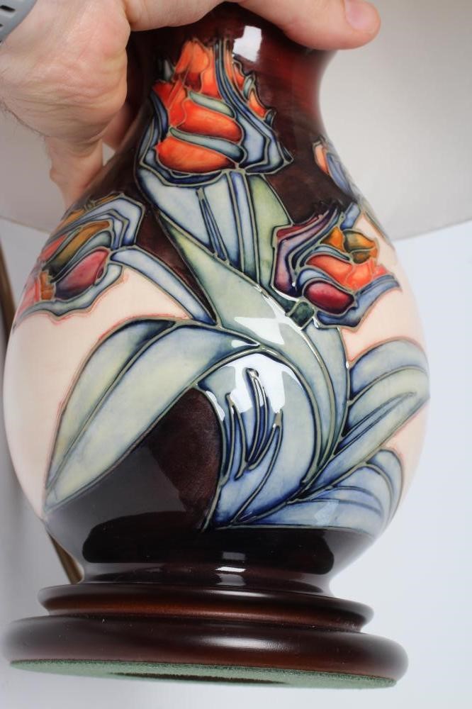 A MOORCROFT POTTERY RED TULIP PATTERN ELECTRIC TABLE LAMP BASE, modern, of ovoid form designed by Image