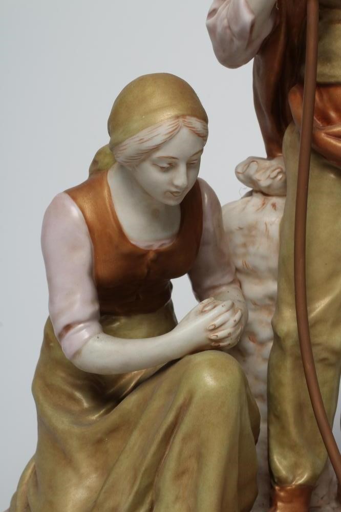 A ROYAL DUX PORCELAIN FIGURE GROUP Image