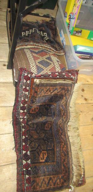 THREE CUSHIONS AND A RUG Image