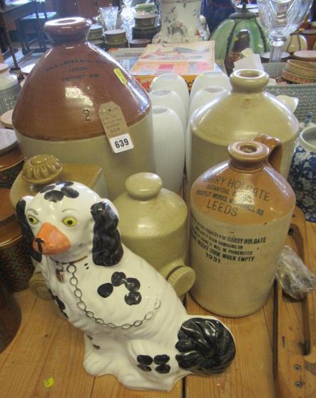 QUANTITY OF STONEWARE BOTTLES AND A STAFFORDSHIRE SPANIEL Image