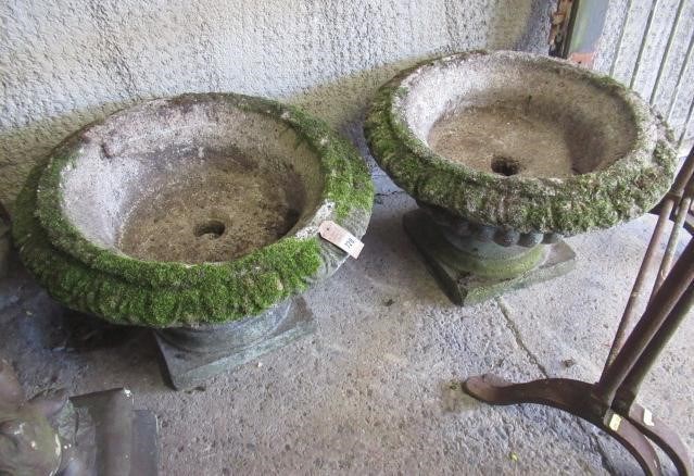 PAIR OF COMPOSITE GARDENS URNS, the shallow half fluted bowl with ovolo moulded rim, moulded socle Image