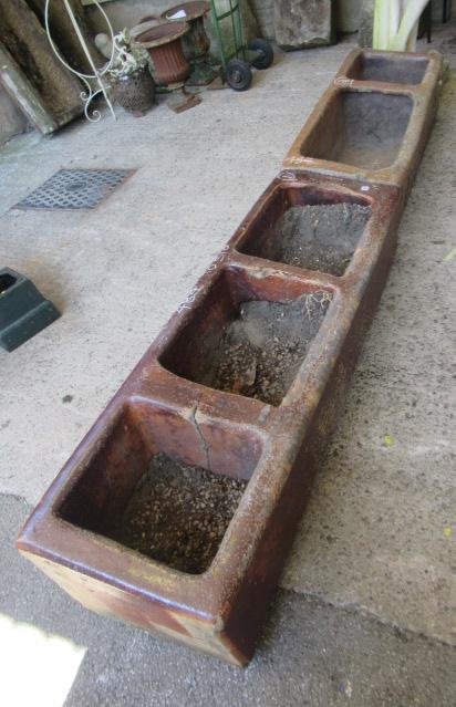 TWO SALT GLAZED FEEDING TROUGHS Image