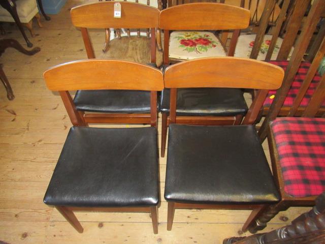 FOUR MID CENTURY TEAK CHAIRS Image